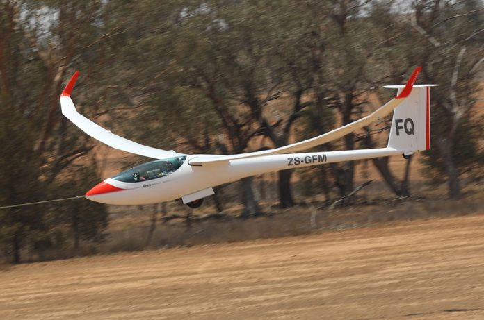 Gliding French competitor Melanie Gadoulet in action at the Women's World Gliding Championships at Lake Keepit in January this year, where she won the 18-metre class championship. Photo: John Hoye.